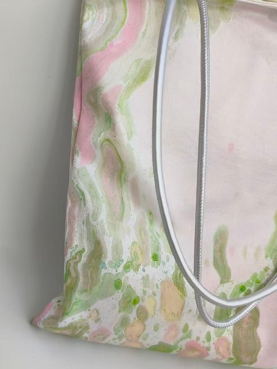 Meadow Mist close-up of its silver straps